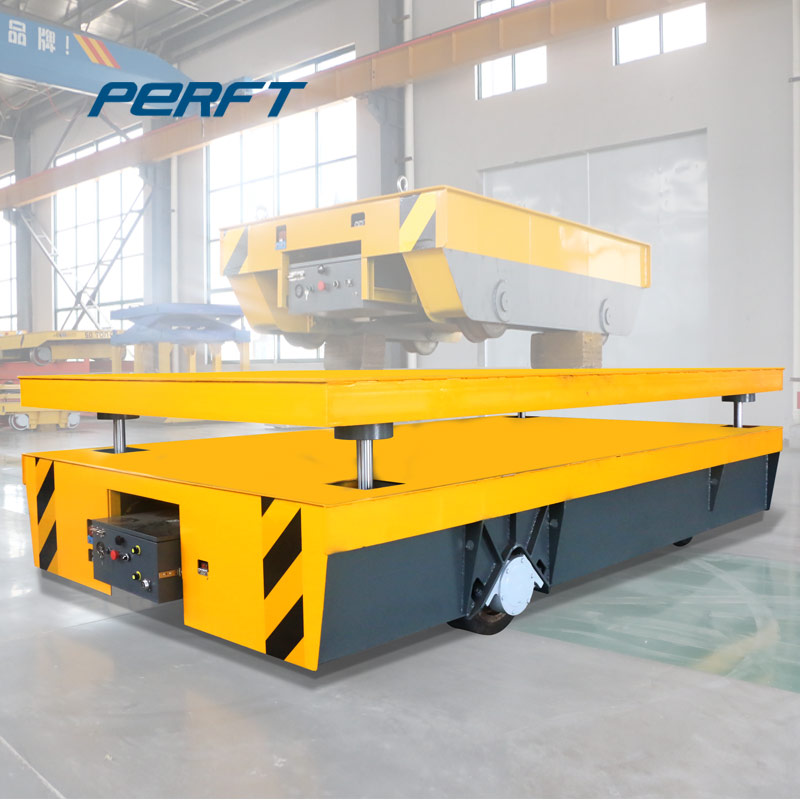 Large hydraulic lifting electric trackless flat car