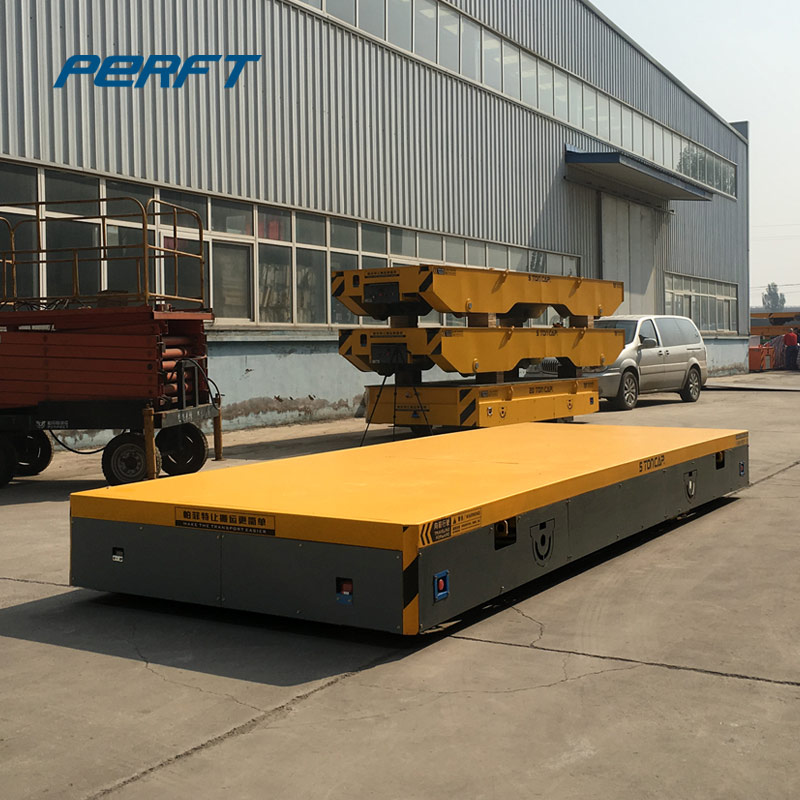 Heavy and large capacity trackless material handling vehicle
