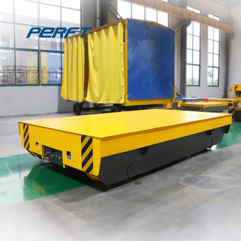 Rail turning vehicle powered by lithium battery for carrying steel plate