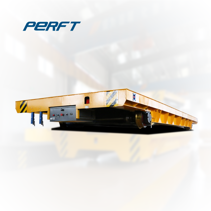 Large-capacity positioning rail flat car powered by cable reel