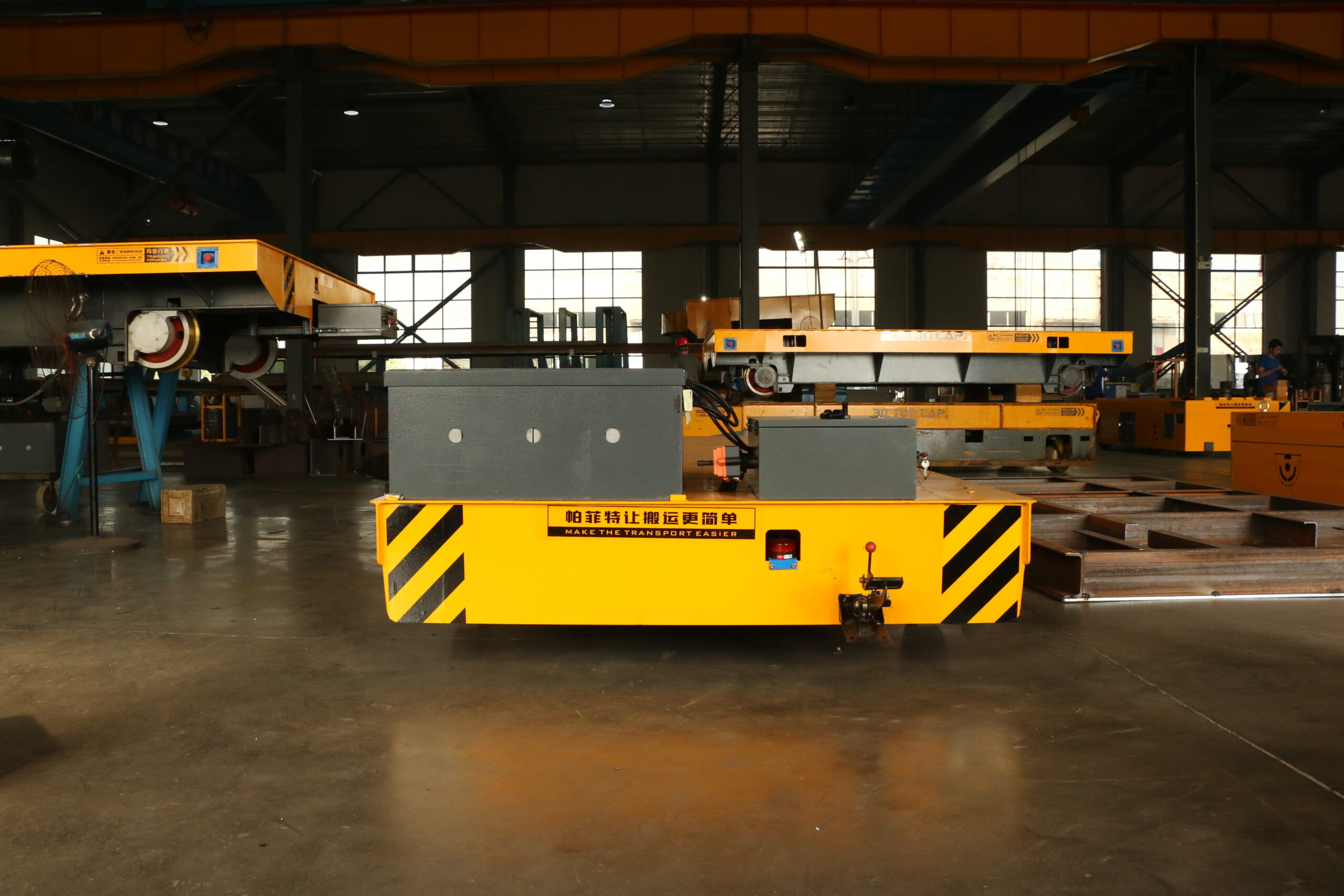 Rail transfer vehicle for tunnel transportation of materials