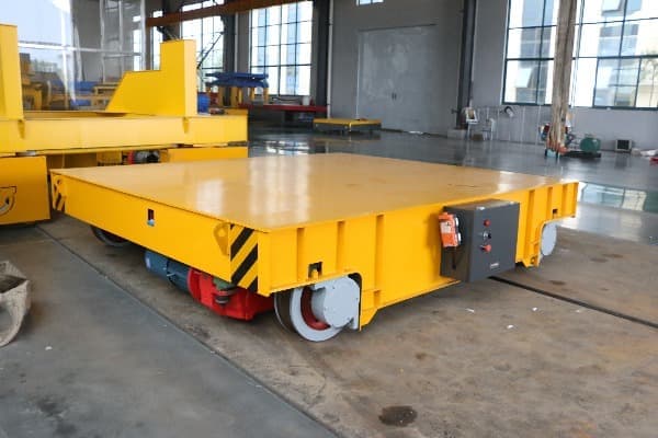 Electric rail transfer trolley to move mold between crane bays